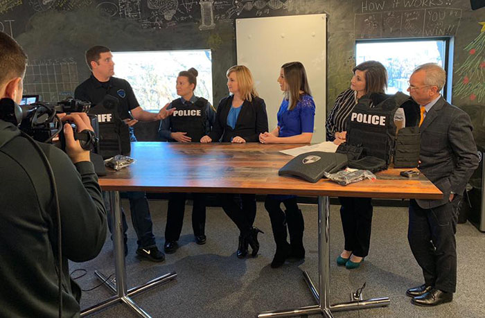 Northwest Lt. Amanda Cullin (standing second from left behind table) represented the University Police Department Jan. 9 as it received a donation of equipment through WDAF-TV’s “Working For Blue” initiative. (Submitted photo)