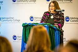 Dr. Kathrine Swanson, the vice chancellor for student success and engagement at MCC, addresses a crowd gather to hear details of the improved FastTracks program.