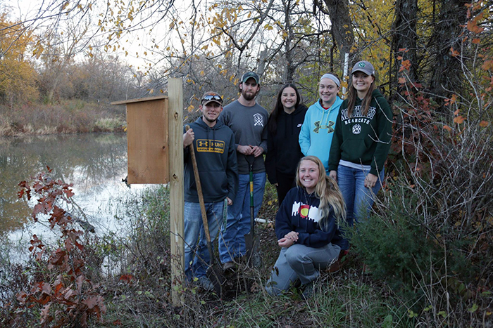 Northwest Wildlife Club members (clockwise from left) Ryan Dawson, Jackson Lillard, Maddy Goodwin, Kourtney Chiddix, Ashlea Pennington and Brittany Hutchens erected two wood duck nesting boxes at Mozingo Lake last November. The new student organization provides opportunities to complete service projects and network with professionals in the wildlife field. (Submitted photo)