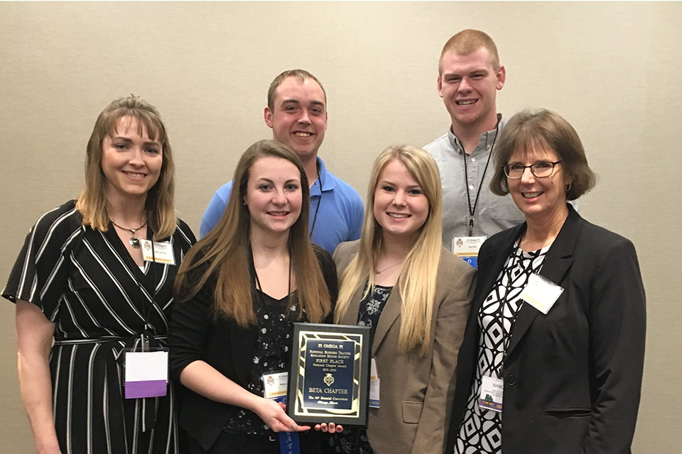 Northwest's chapter of Pi Omega Pi was named the top chapter in the nation last weekend at the National Business Education Association Convention. Left to right in the front row are Cari Cline, Melissa Potter, Allie Stanley and Dr. Nancy Zeliff. In the back row are Eddy Kraber and Trey Kothe. (Submitted photo)