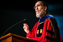 Dr. Michael Rogers delivers the evening's commencement address.