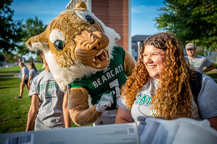 Members of the 'Cat Crew annually help new students move into Northwest residence halls in anticipation of the fall semester. (Northwest Missouri State University photos)  