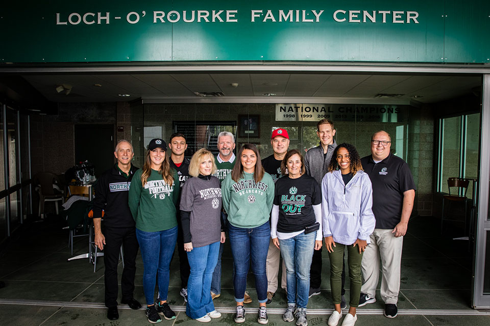 Northwest named the Rawie family its 2019 Family of the Year. Left to right in the front row are Megan Rawie, Joy Crisler, Jessica Rawie, Cindy Rawie and Student Senate President Asma Hassan. In the back row are Northwest President Dr. John Jasinski, Robert Rawie, Pat Crisler, Doug Rawie, Northwest Director of Campus Dining Spencer Martin and Director of Alumni Relations and Annual Giving Bob Machovsky. (Photo by Todd Weddle/Northwest Missouri State University) 