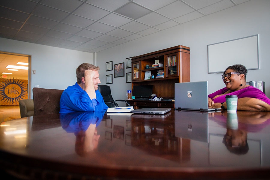 Leslie Doyle meets with Kirk Skoglund ’12, the director of the Learning Center at Rockhurst University, to discuss initiatives for the upcoming academic year. As she settles into her new role at Rockhurst, 