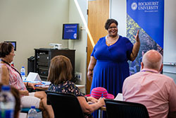 Leslie Doyle speaks to a group of high school counselors about diversity, equity and inclusion efforts at Rockhurst University.  