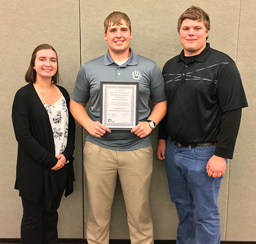 Jacob Meyer (center) is pictured with Mid-America Collegiate Horticultural Society vice chairs Sierra Hau and Jordan Gretzlock after earning first place in its general knowledge contest. (Submitted photo)