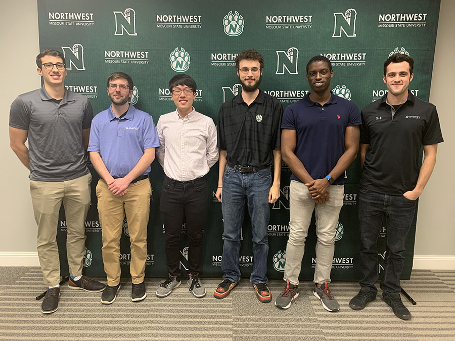 Team Inciport took first place in the Evergy contest. Pictured left to right are Evergy application developers Seth Walz and Hayden Rainey, Team Inciport members Dave Chen, Kenny Grannas and Valentine Osakwe, and Evergy data analyst Jory Galloway. 