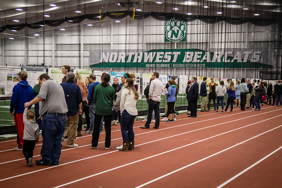 Northwest students, faculty and staff, community members and area employers attended PBL Palooza Tuesday evening at the Carl and Cheryl Hughes Fieldhouse to view poster presentations details students' profession-based experiences. (Photo by Brandon Bland/Northwest Missouri State University)