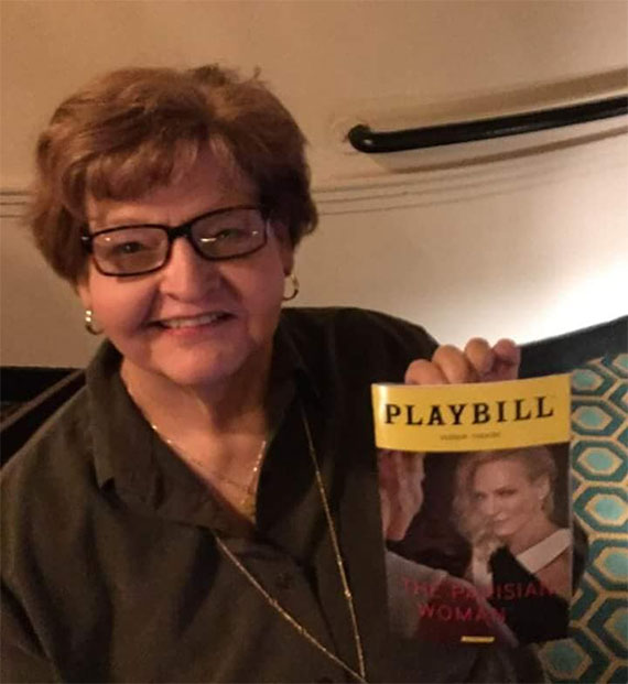 Janet Stuck Jelavich holds a playbill while attending a show. Jelavich, a 1977 Northwest graduate who died last year, was passionate about theatre. Her husband, Mark, a retired Northwest faculty member, recently established the Janet (Stuck) Jelavich Scholarship in her memory. (Submitted photo)