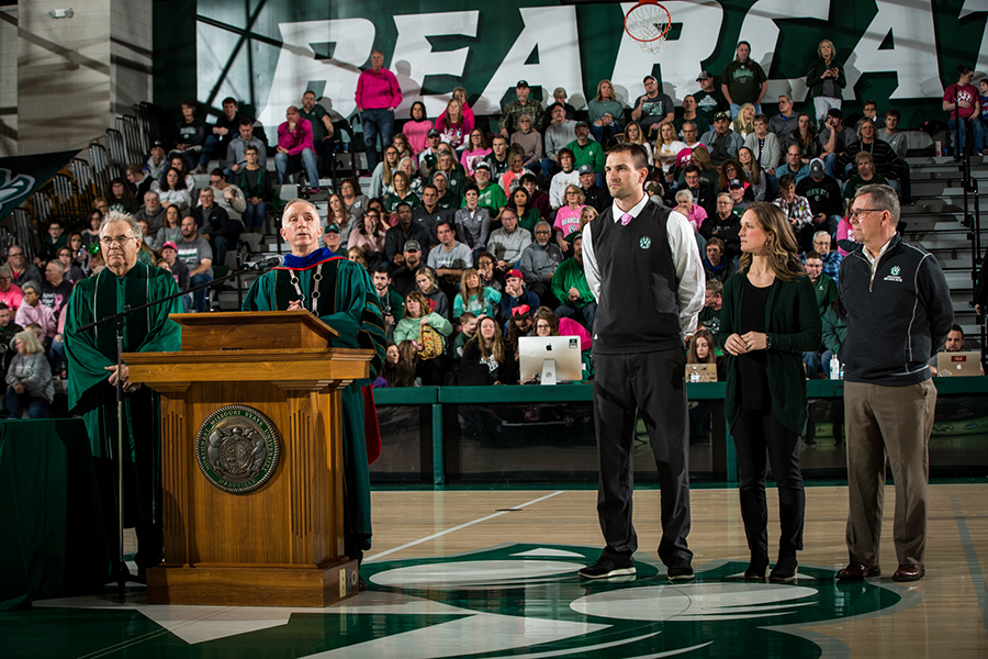 Dr. Patrick Harr (left) stands by as Northwest presented him Saturday with an honorary degree. Northwest President Dr. John Jasinski presented the degree to Harr as Northwest Director of Athletics Andy Peterson, Head Athletic Trainer Kelly Quinlin and former Head Athletic Trainer Dr. David “D.C.” Colt took turns reflecting on Harr’s service and friendship. (Photo by Todd Weddle/Northwest Missouri State University)