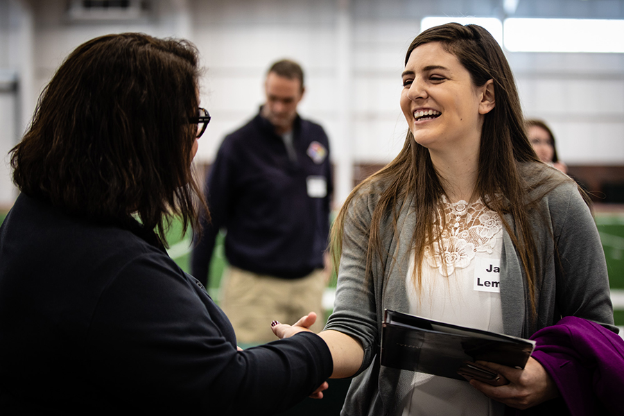 A Northwest student connects with an employer during Career Day. Northwest is hosting its annual spring Career Day March 4. (Photo by Brandon Bland/Northwest Missouri State University)