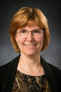 Dr. Christine Benson