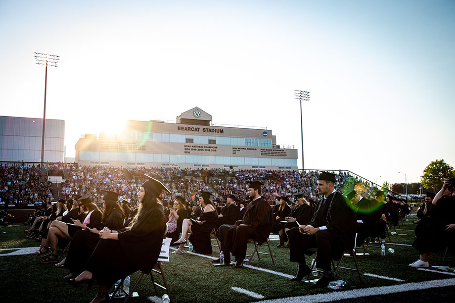 Northwest graduates participating in Saturday's commencement ceremony at Bearcat Stadium were seated farther apart than previous ceremonies as the University implemented COVID-19 mitigation measures. 