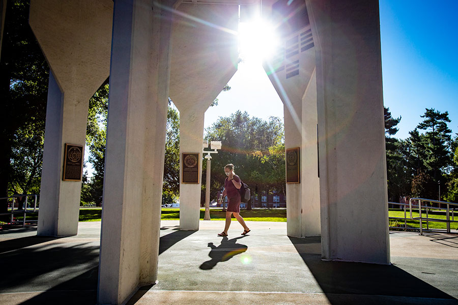 A student walks under the Memorial Bell Tower Wednesday morning, which marked the first day of the fall 2020 semester at Northwest. (Photos by Todd Weddle/Northwest Missouri State University) 