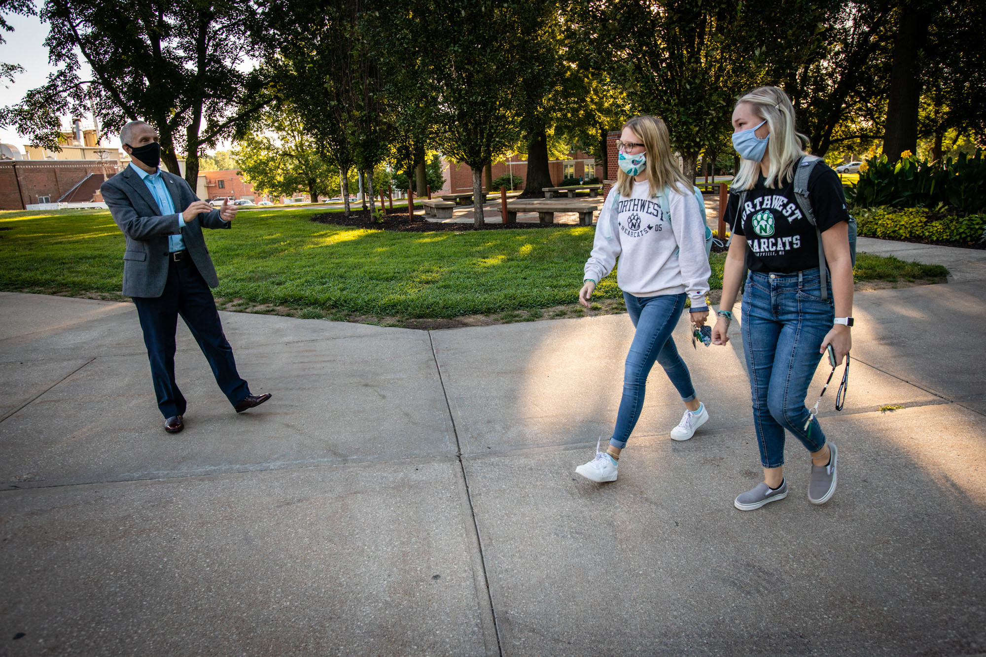 Northwest President Dr. John Jasinski greeted students as they walked across campus on their first day of classes Aug. 19. (Photo by Todd Weddle/Northwest Missouri State University)
