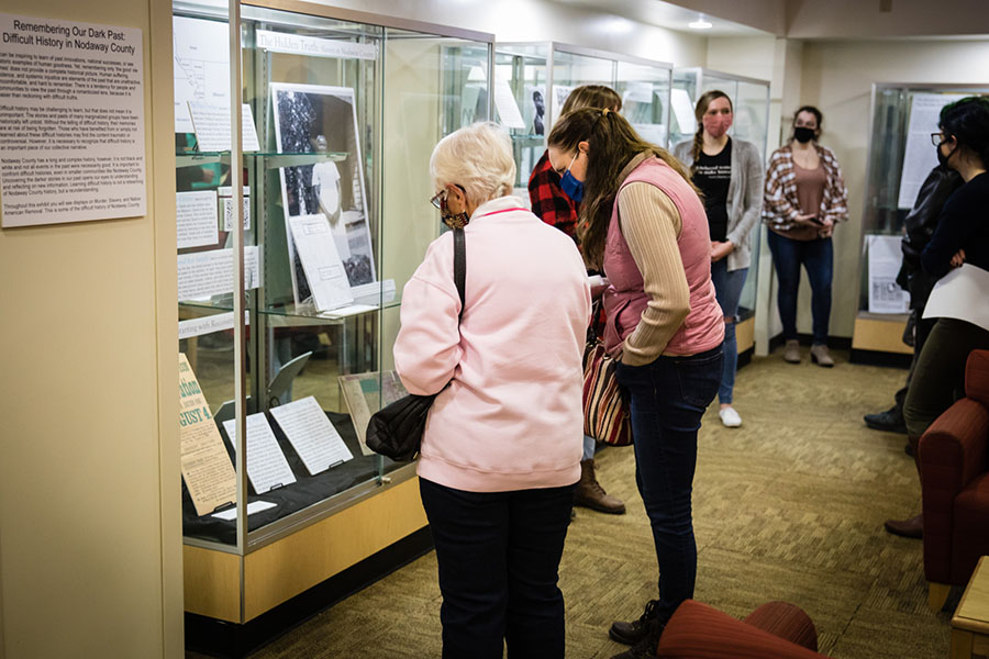 Visitors view a new exhibit at Valk Center that reviews some of Nodaway County's difficult history. (Photos by Brandon Bland/Northwest Missouri State University)