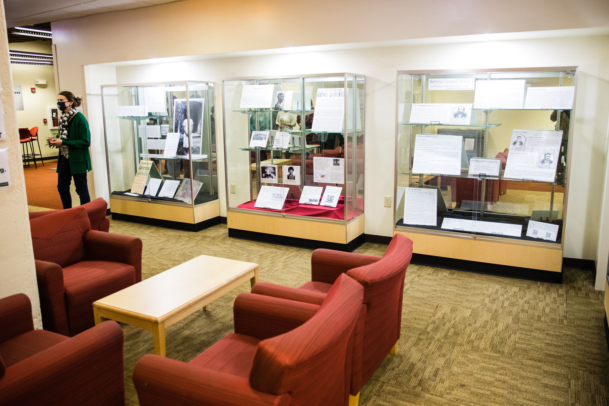 Northwest Associate Professor of History Dr. Elyssa Ford introduces the difficult history exhibit in the lower level of Valk Center during an opening event on Nov. 23. 