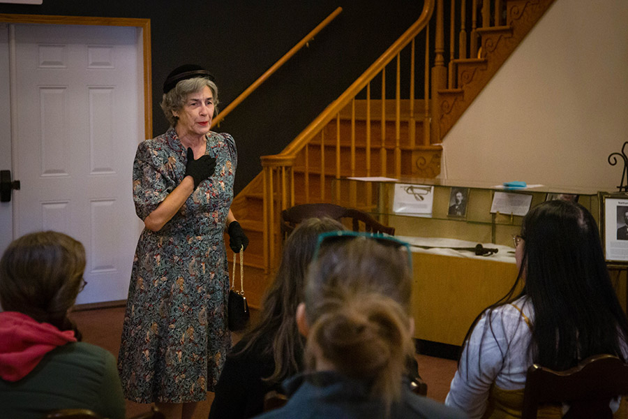 Students in Northwest’s history practicum course viewed a presentation by Kathleen Boswell as they learned how to prepare a living history exhibit featuring Nodaway County figures. Boswell portrayed Mildred Whiteman Rogers, an aunt of George Allison Whiteman, who was killed in the Dec. 7, 1941, attack on Pearl Harbor, the first American pilot casualty of World War II. (Photo by Abigayle Rush/Northwest Missouri State University)