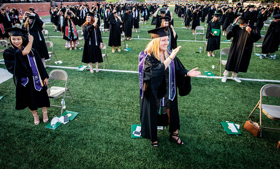 Graduates were spaced on the Bearcat Stadium turf in August.