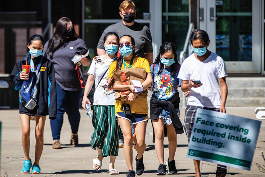 Signs dotted the campus landscape and inside buildings this fall with reminders to wear face coverings and maintain social distance.