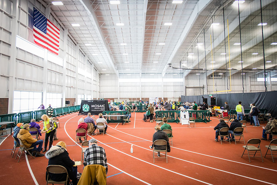 Community members await their vaccines Thursday morning during a clinic at the Hughes Fieldhouse. The weekly vaccination clinics have further proven the facility's value as a University and community asset. (Photos by Todd Weddle/Northwest Missouri State University)