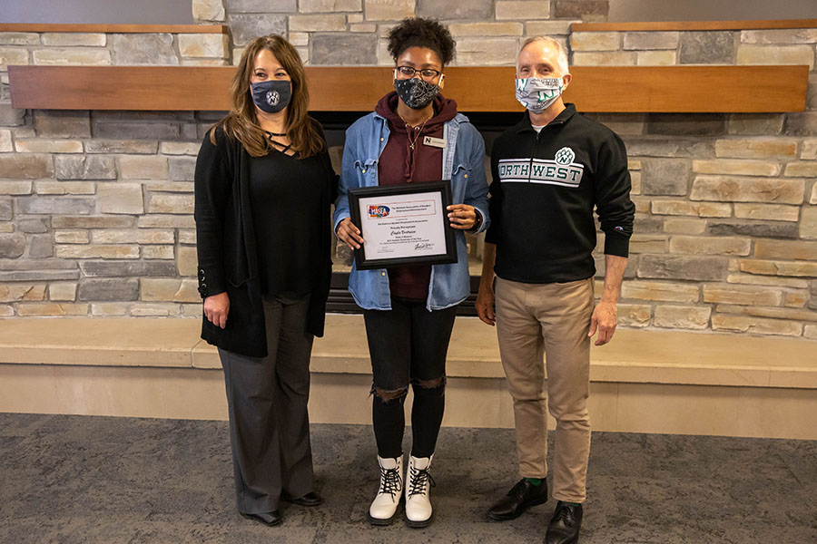 Northwest recognized Cayla Vertreese Friday as its Student Employee of the Year as well as the recipient of Missouri's Student Employee of the Year award. Left to right are Paula McLain, Northwest’s student employment coordinator; Vertreese; and Northwest President Dr. John Jasinski. (Photo by Todd Weddle/Northwest Missouri State University)