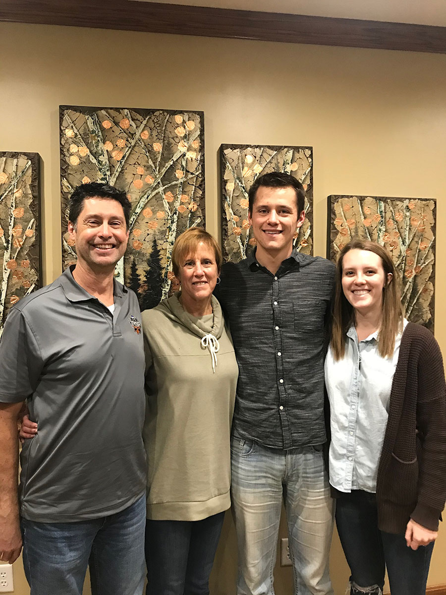 Ken and Jeanette Scribner with their son, Garrett, and his fiancé, Madison Olberding