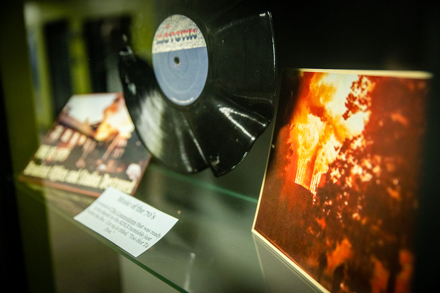 Melted records and other paraphernalia recovered from the ruins of KXCV's studios in the wake of the Administration Building fire are displayed in the Warren Stucki Museum of Broadcasting in Wells Hall.