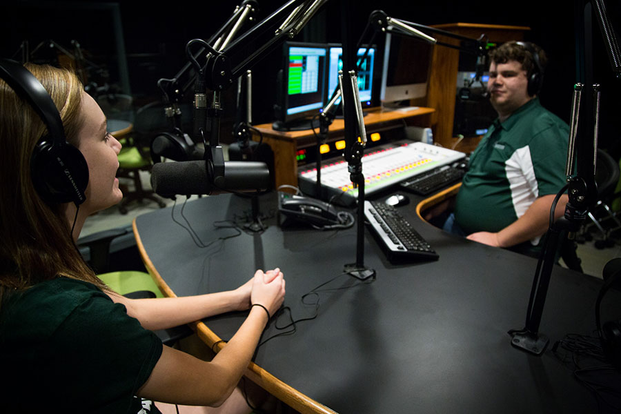 A pair of Northwest students produce a program after KXCV studios were remodeled in 2016.