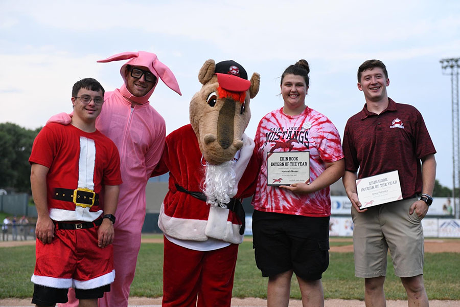 Northwest student Hannah Moser (second from right) worked as a summer intern with the St. Joseph Mustangs Baseball Organization and was recognized as one of its outstanding interns. Moser was one of about 250 Northwest students to complete summer internships this year. (Submitted photos)