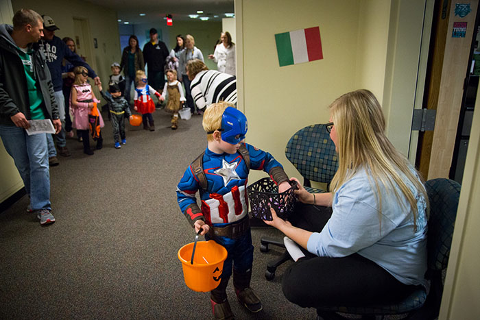 Northwest students annually welcome families into residence halls for a night of trick-or-treating. (Photo by Todd Weddle/Northwest Missouri State University)