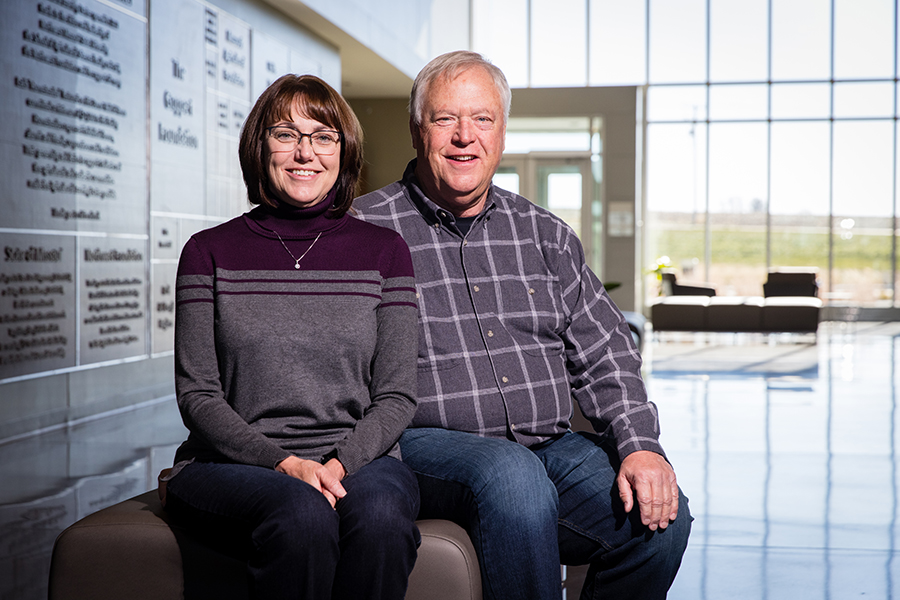 Mark Watkins and his wife, Carol, are pictured inside the Agricultural Learning Center on the R.T. Wright Farm. (Photo by Todd Weddle/Northwest Missouri State University)