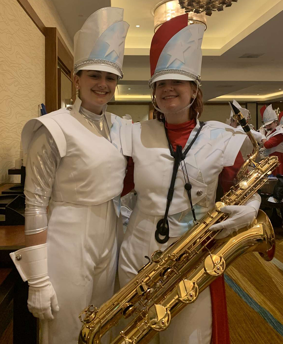 Bearcat Marching Band members Brooklyn Ellis (left) and Alex Done posed for this photo prior to a performance with the Bands of America (BOA) Tournament of Roses Honor Band.