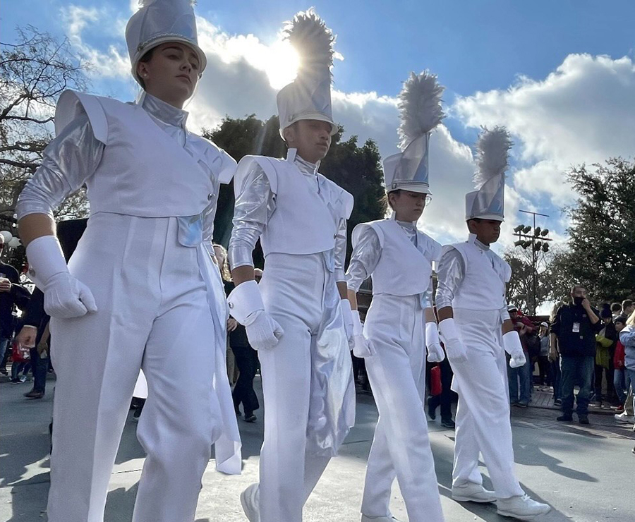 Brooklyn Ellis (left) participated with the Bands of America (BOA) Tournament of Roses Honor Band as a drum major.