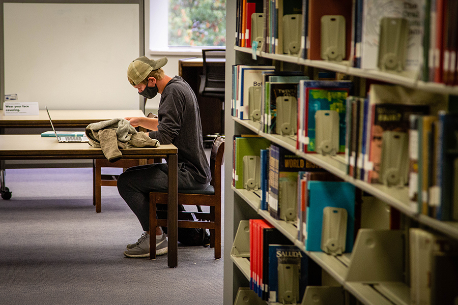 A student works in the B.D. Owens Library, where the University community is invited to participate in a Human Library on April 5. (Northwest Missouri State University photo)