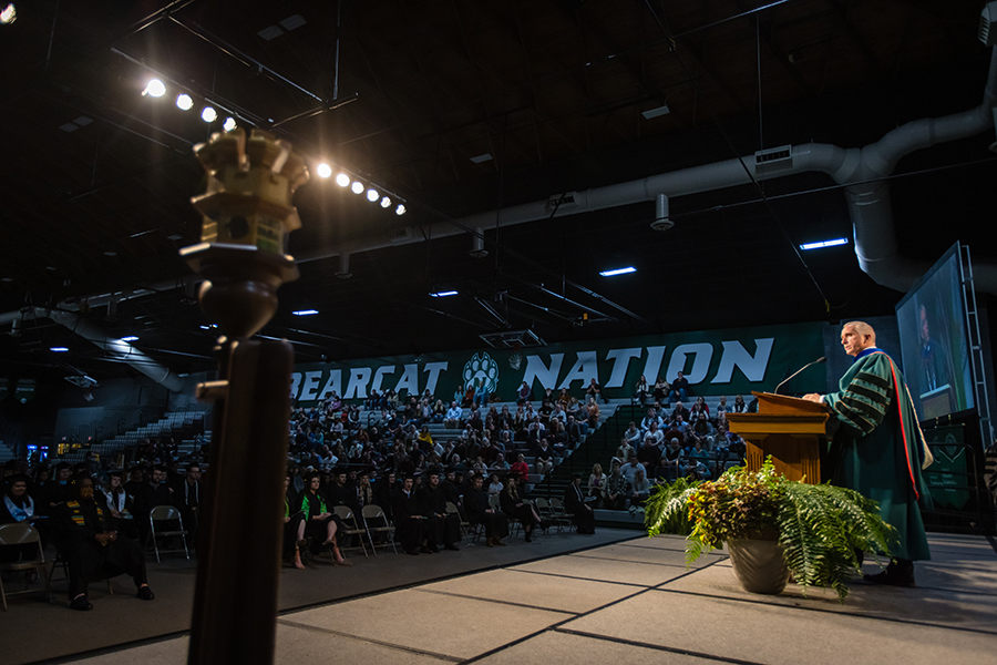 Northwest President Dr. John Jasinski addresses graduates and their families during a spring commencement ceremony. 