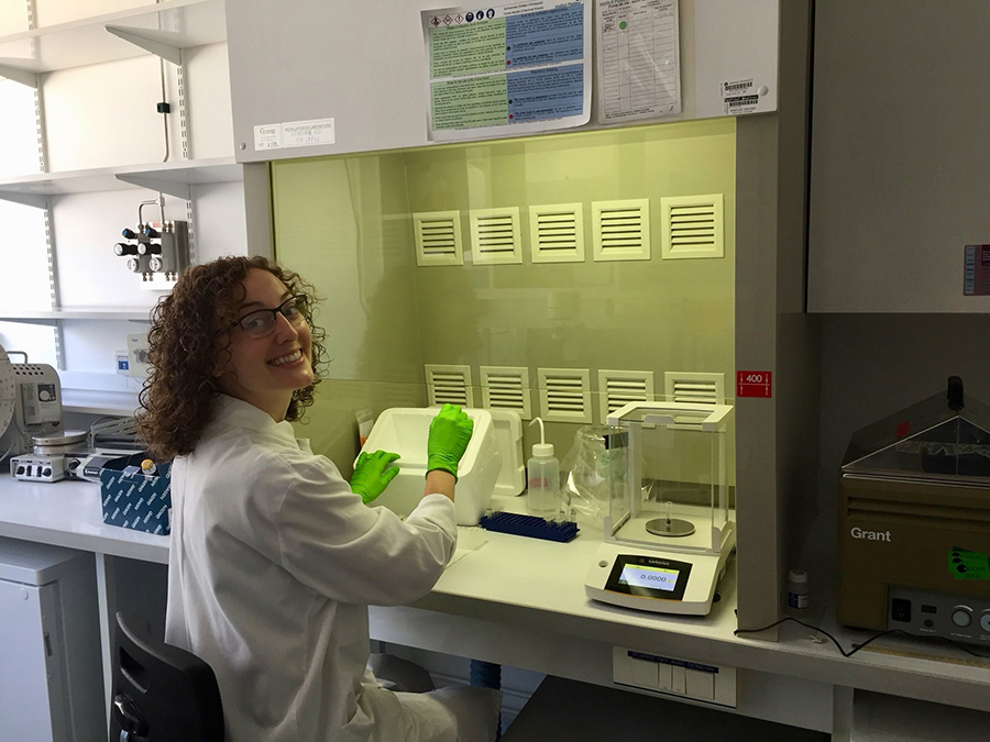 Northwest alumna Courtney Thomas, pictured in a microbial cell lab at Institut Pasteur as she extracted DNA from animal fecal samples, is a scientific writer. She completed a Ph.D. in microbiology at the Institut Pasteur in Paris. (Submitted photo)
