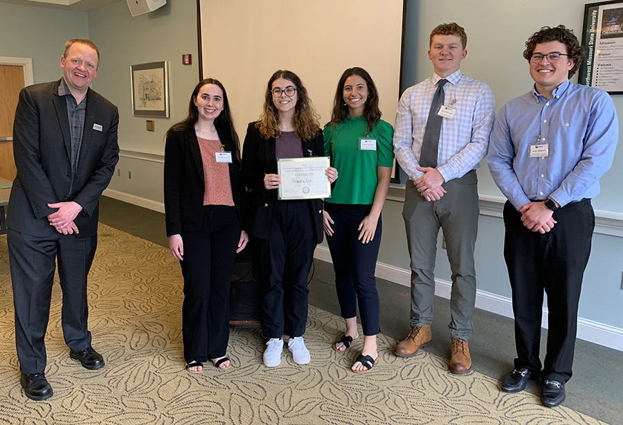 Pictured above with Dr. Ben Blackford (left), the winning team consisted of Megan Harris, a junior marketing and management major from Kansas City, Missouri; Payton Schomburg, a senior human resource management major from Rock Port, Missouri; Cady Crawford, a junior marketing and management major from Osceola, Iowa;  Grant Atwood, a senior business management major from Leon, Iowa; and Aiden Peterson, a junior business management major from Underwood, Iowa.