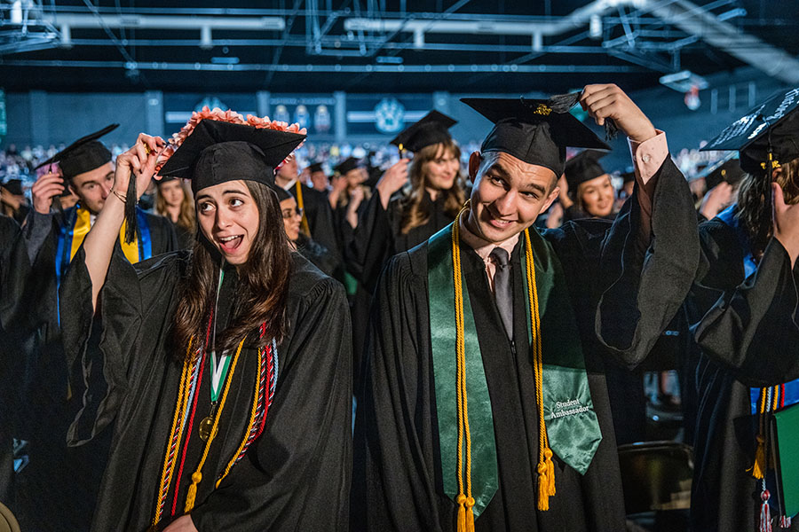 Northwest graduates turn their tassels in recognition of their degree conferrals during one of the University's four commencement ceremonies Friday and Saturday in Bearcat Arena. (Photo by Todd Weddle/Northwest Missouri State University)   