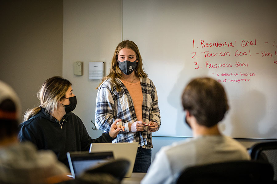 A team of Knacktive students, pictured in February, discusses its ideas to build a comprehensive marketing campaign for Ringgold County, Iowa. 