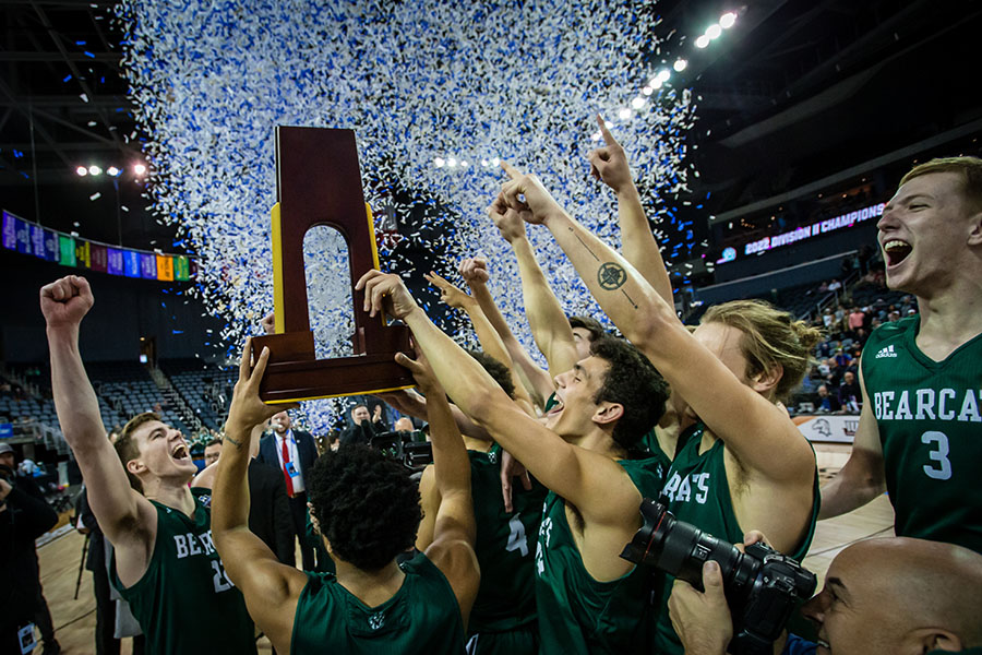 The Bearcat men's basketball team celebrates March 26 after winning its fourth national title in the last five full seasons. (Photo by Todd Weddle/Northwest Missouri State University)