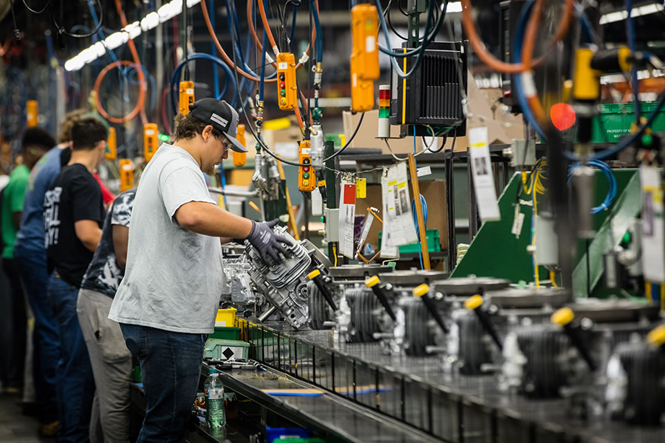 Student-athletes working an assembly line at Kawasaki locked engines to their frames and inspected them for defects. They finished, on average, about 250 engines during their seven-hour shift. 