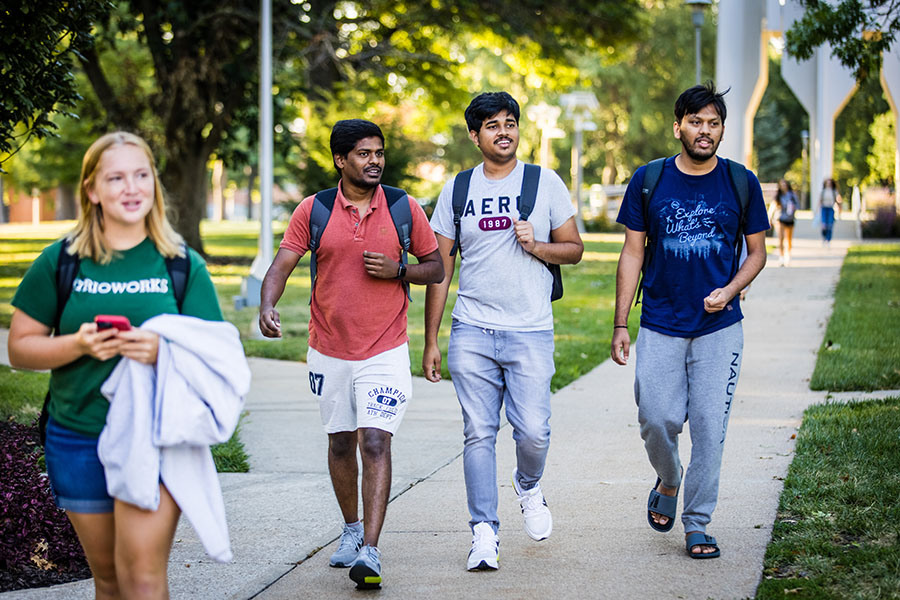 Northwest students cross the University's Maryville campus on the first day of fall classes Wednesday. (Photo by Lauren Adams | Northwest Missouri State University)