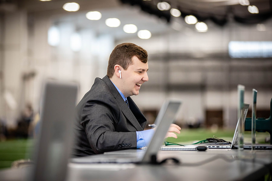 A student interviews online with an employer during one of Career Services' networking events in the Hughes Fieldhouse. (Photo by Todd Weddle/Northwest Missouri State University)