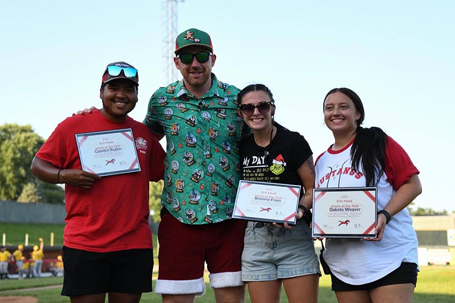 Left to right are Camdyn Rucker, Ky Turner, Brionna Frans and Dakota Weaver. Turner, the owner of the St. Joseph Mustangs Baseball Organization and MO Family Sports, recognized the Northwest students as interns of the year at the conclusion of the Mustangs' baseball season. (Submitted photo)