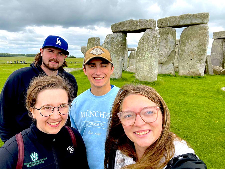 Clockwise from bottom left, Elizabeth Brightwell, Kendrick Calfee, Jonah Dotson and Kiersten Helm are pictured at the famed Stonehenge monument in England during their study abroad experience in Europe. (Submitted photo)