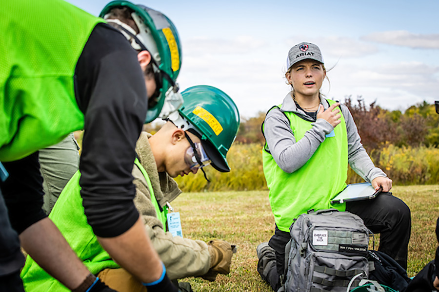 Sydney McQuinn, a nursing student at the University of Missouri-Kansas City, directs a team of first responders during an simulated disaster Friday at Missouri Hope.
