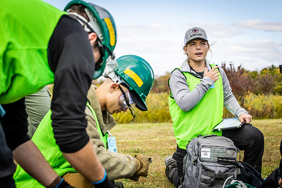 Sydney McQuinn, a nursing student at the University of Missouri-Kansas City, directs a team of first responders during an simulated disaster Friday at Missouri Hope.
