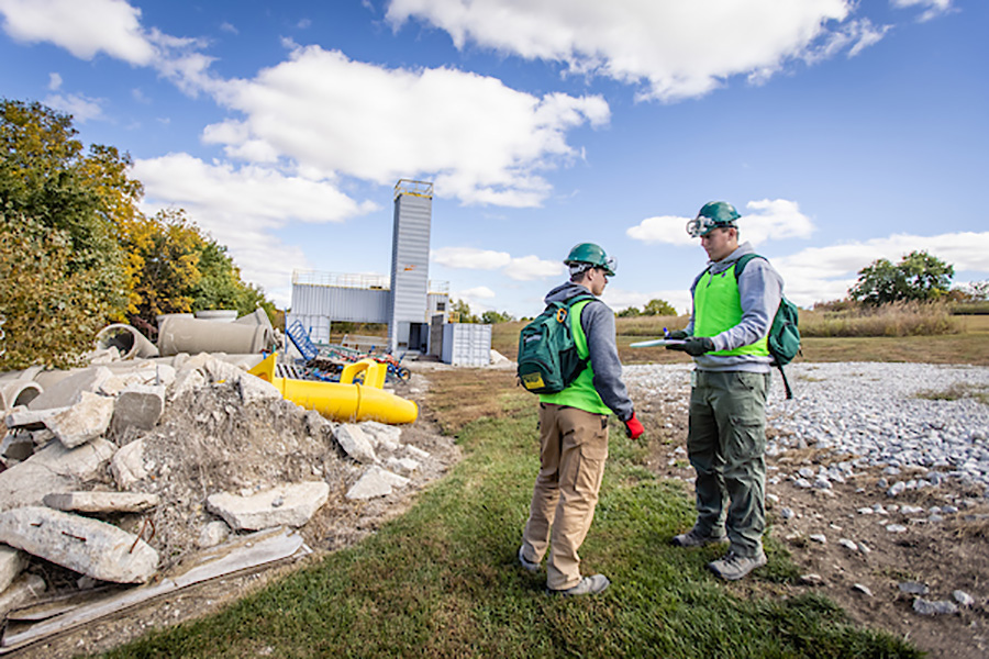 First responders assess the environment during a Friday simulation of a natural disaster.