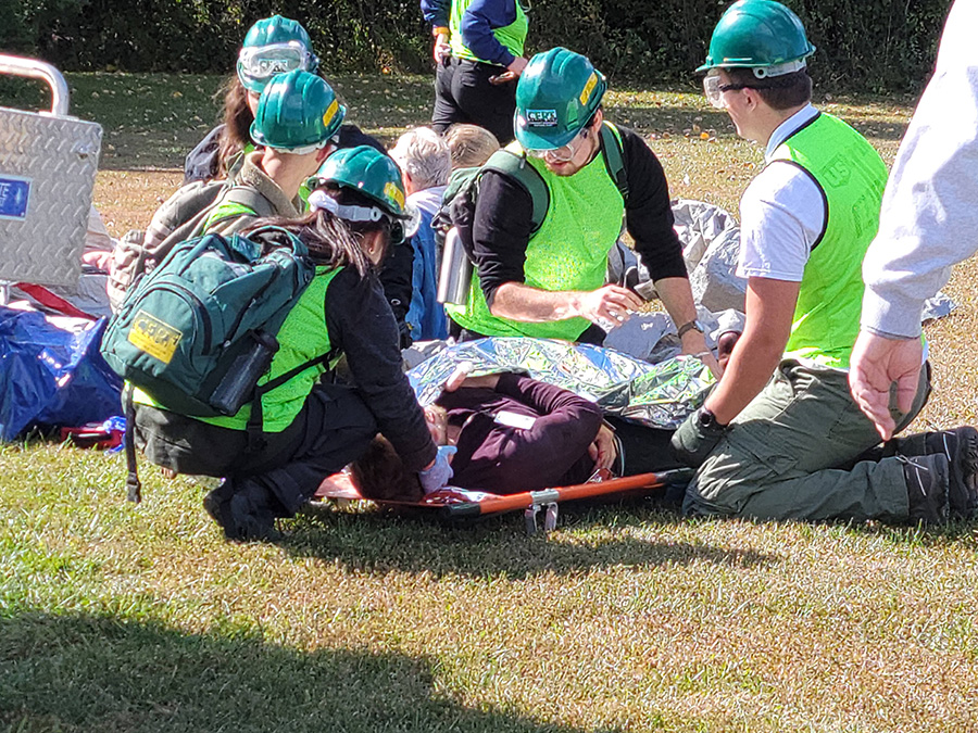 Students working as first responders assist volunteers portraying victims of a natural disaster during Missouri Hope. (Northwest Missouri State University photos)